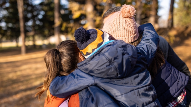 Decorative image of family hugging