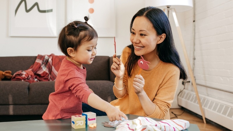 Decorative image of a mother bonding with her child, helping her daughter get adjusted to the changes in their lives and routines.